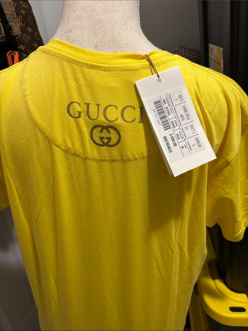 Gucci Yellow V-Neck Tee with Multicolor Superhero Graphic